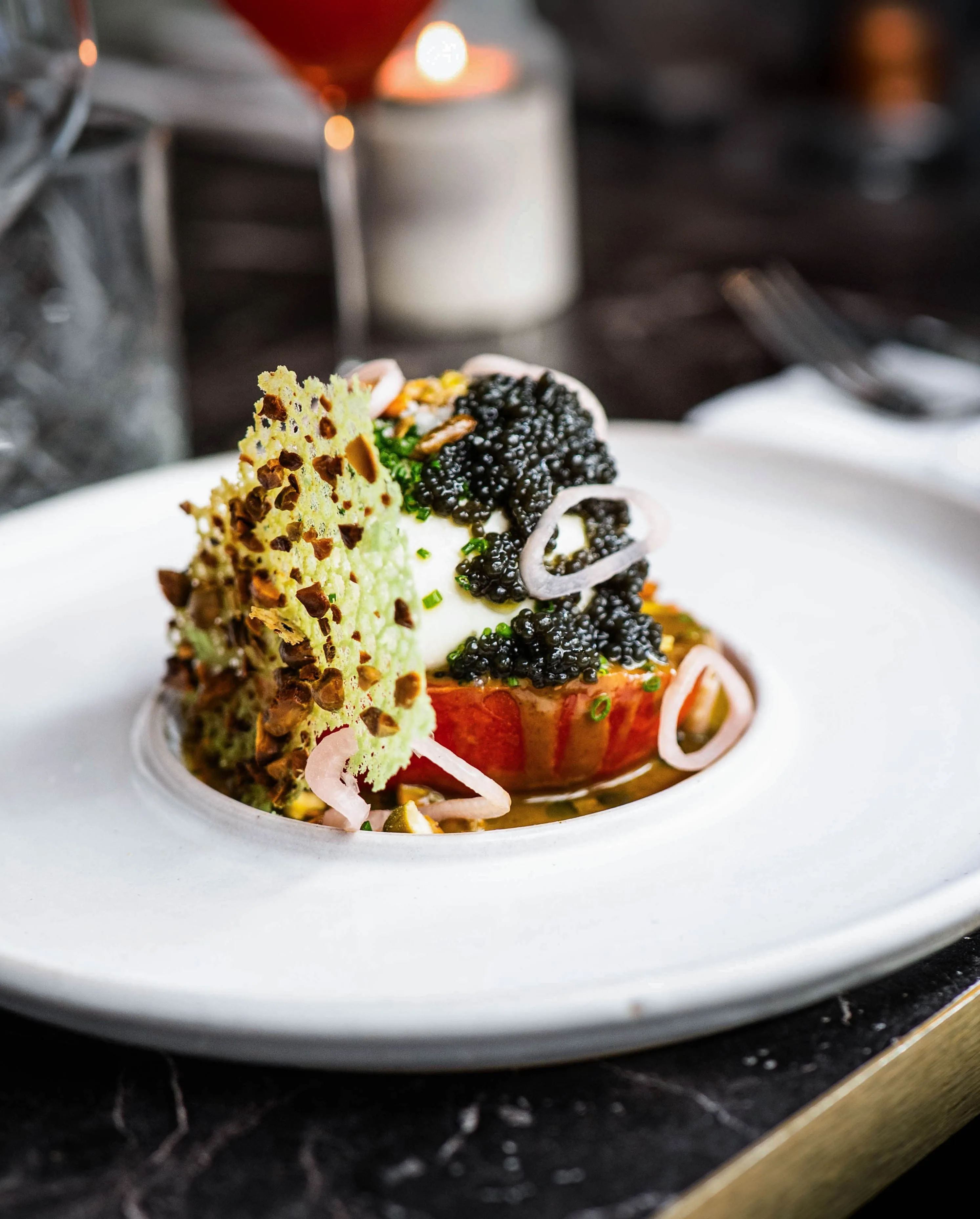 Plat signature NESSIA — accord mets et présentation visuelle soignée